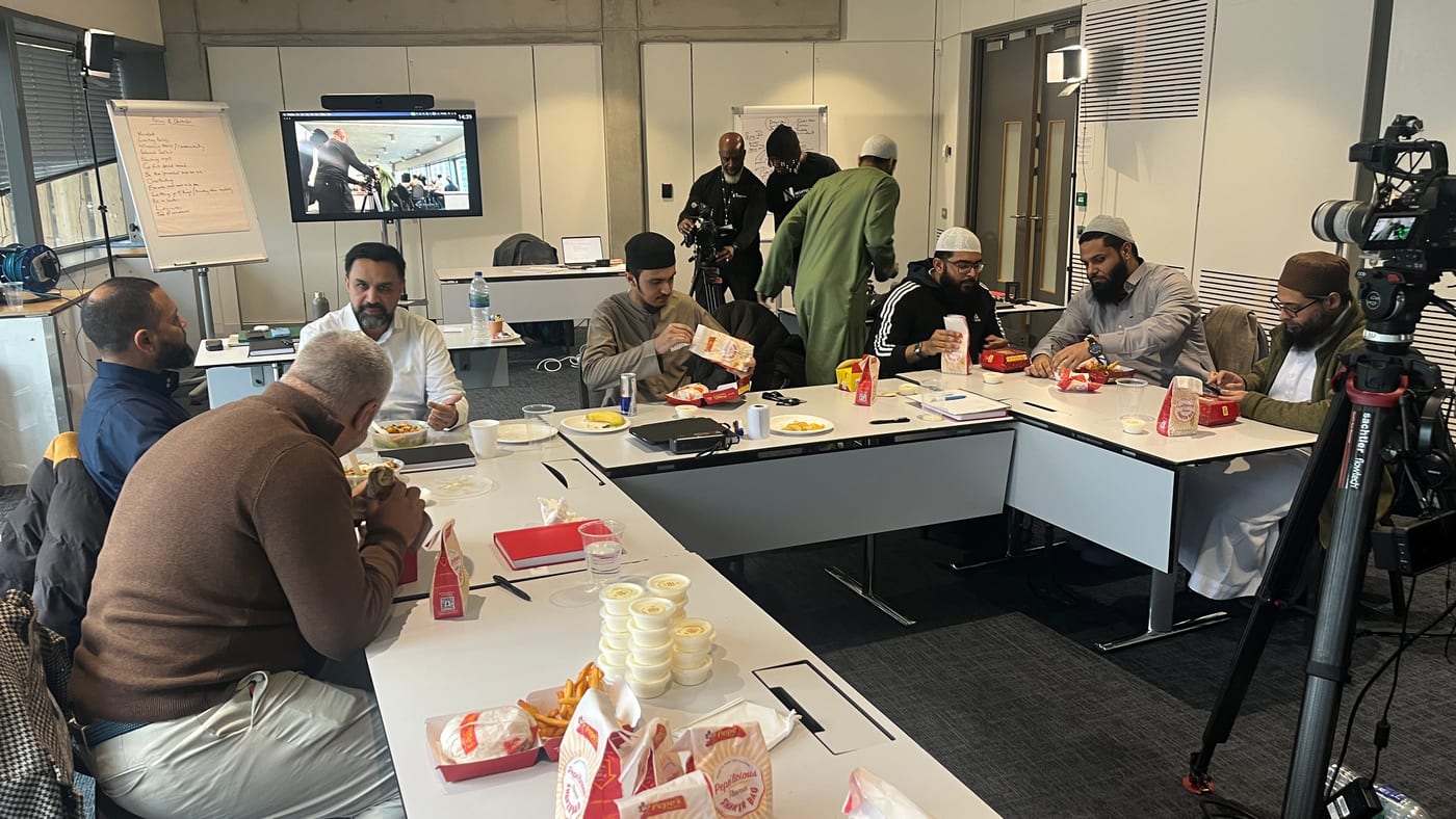 The Elevate cohort working together during an in-person intensive